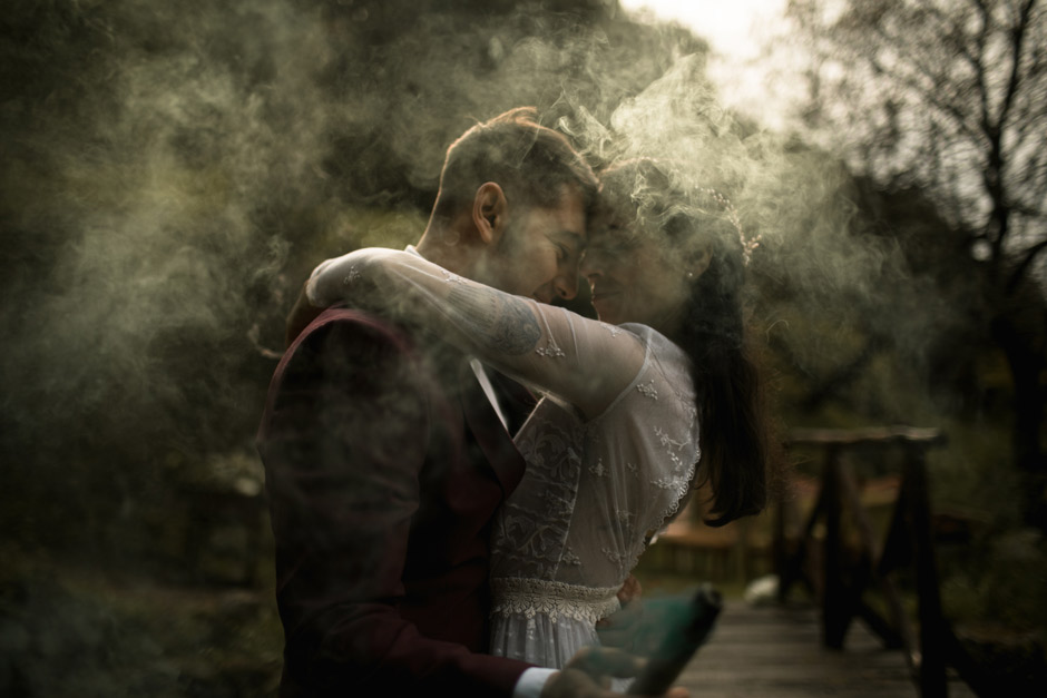 creative and smoky portrait for the bride and groom