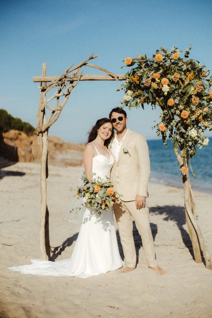 Beach wedding in sardinia - The ceremony was held on the beach with burnt orange-themed decorations