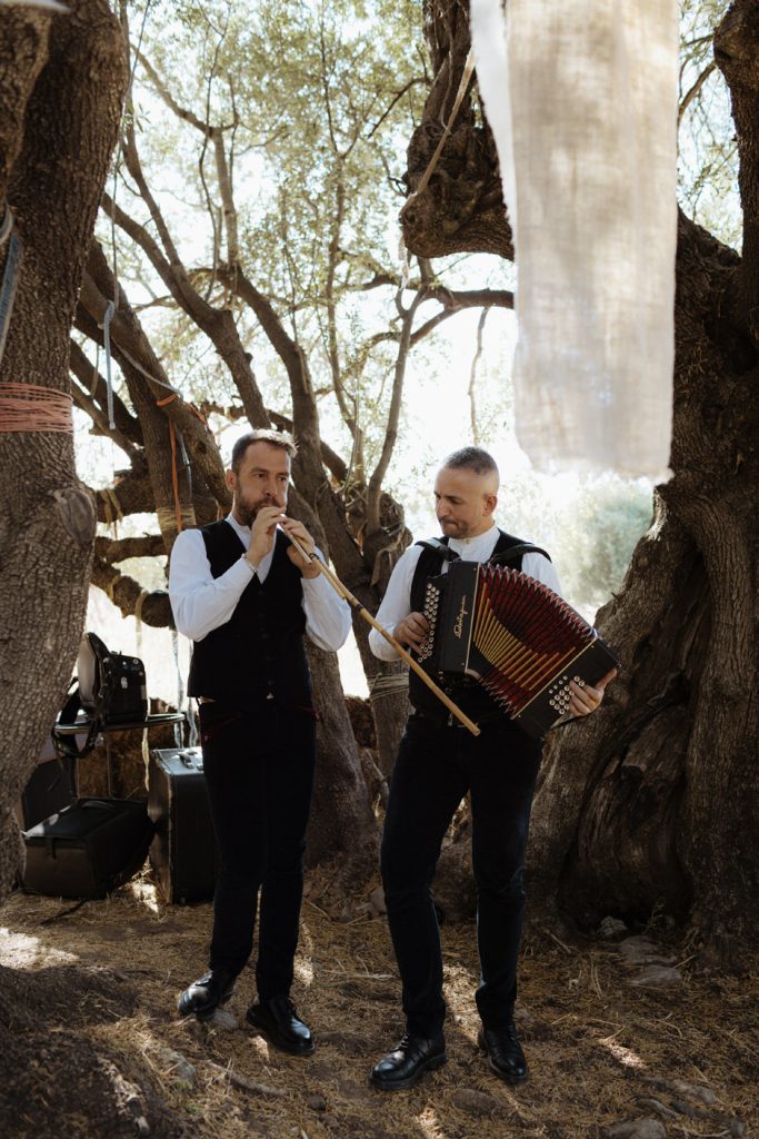 wedding ceremony at Sos Nidos , Hotel Su Gologne with typical Sardinian music launeddas and organetto